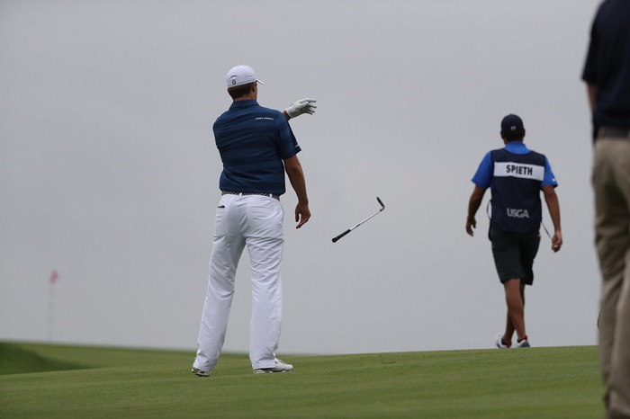 Spieth unhappy with the result of a shot during the first round (Source: Golf.com)