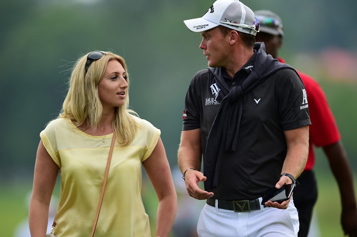 Danny Willett waits out one of three weather delays on Thursday (Source: Golf.com)