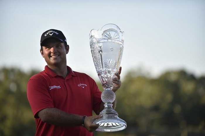 Aug 28, 2016; Farmingdale, NY, USA; Patrick Reed holds up the Barclays trophy on the 18th green during the final round of The Barclays golf tournament at Bethpage State Park - Black Course. Mandatory Credit: Eric Sucar-USA TODAY Sports