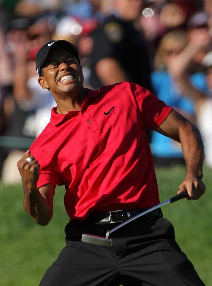 SAN DIEGO - JUNE 15: Tiger Woods reacts to his birdie putt on the 18th green to force a playoff with Rocco Mediate during the final round of the 108th U.S. Open at the Torrey Pines Golf Course (South Course) on June 15, 2008 in San Diego, California. (Photo by Doug Pensinger/Getty Images)