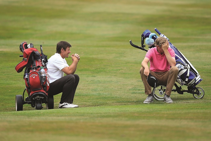CHESTER, ENGLAND - AUGUST 13: Phillip Edwards of Nottinghamshire Golf Lessons and David Griffiths take a rest during slow play during day two of the Golfbreaks.com PGA Fourball Championship Final at De Vere Carden Park Hotel on August 13, 2015 in Chester, England. (Photo by Jan Kruger/Getty Images)