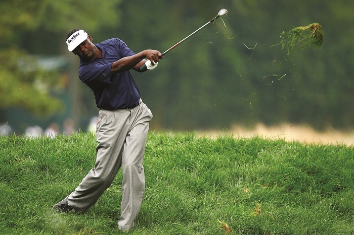 EDISON, NJ - AUGUST 25: Vijay Singh of Fiji hits a shot out of the rough on the 15th hole during round one of The Barclays at Plainfield Country Club on August 25, 2011 in Edison, New Jersey. (Photo by Scott Halleran/Getty Images)