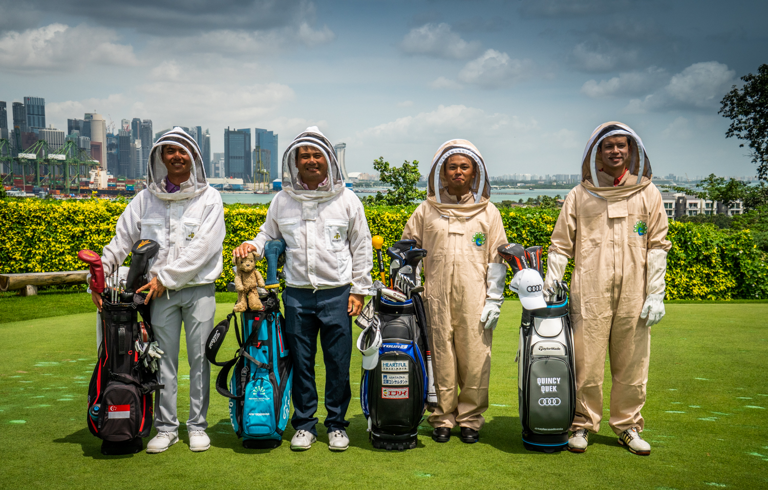 Asian Tour players James Leow, Quincy Quek, Koh Deng Shan, Naoki Seikto try beekeeping