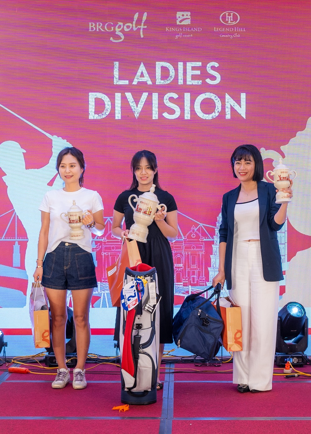 02_Nu_gon_thu_Truong_Ha_Mi_(giua)_gianh_chuc_vo_dich_BRG_Golf_Hanoi_Festival_2024_voi_tong_diem_129_gay.JPG (701 KB)